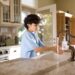 Glass food containers and reusable kitchen items used to reduce plastic exposure at home