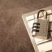Digital login and smartphone security image illustrating safer mobile accounts and SIM-swap protection